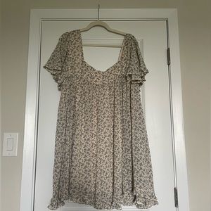 Adorable baby doll dress with flutter sleeves. Never worn.